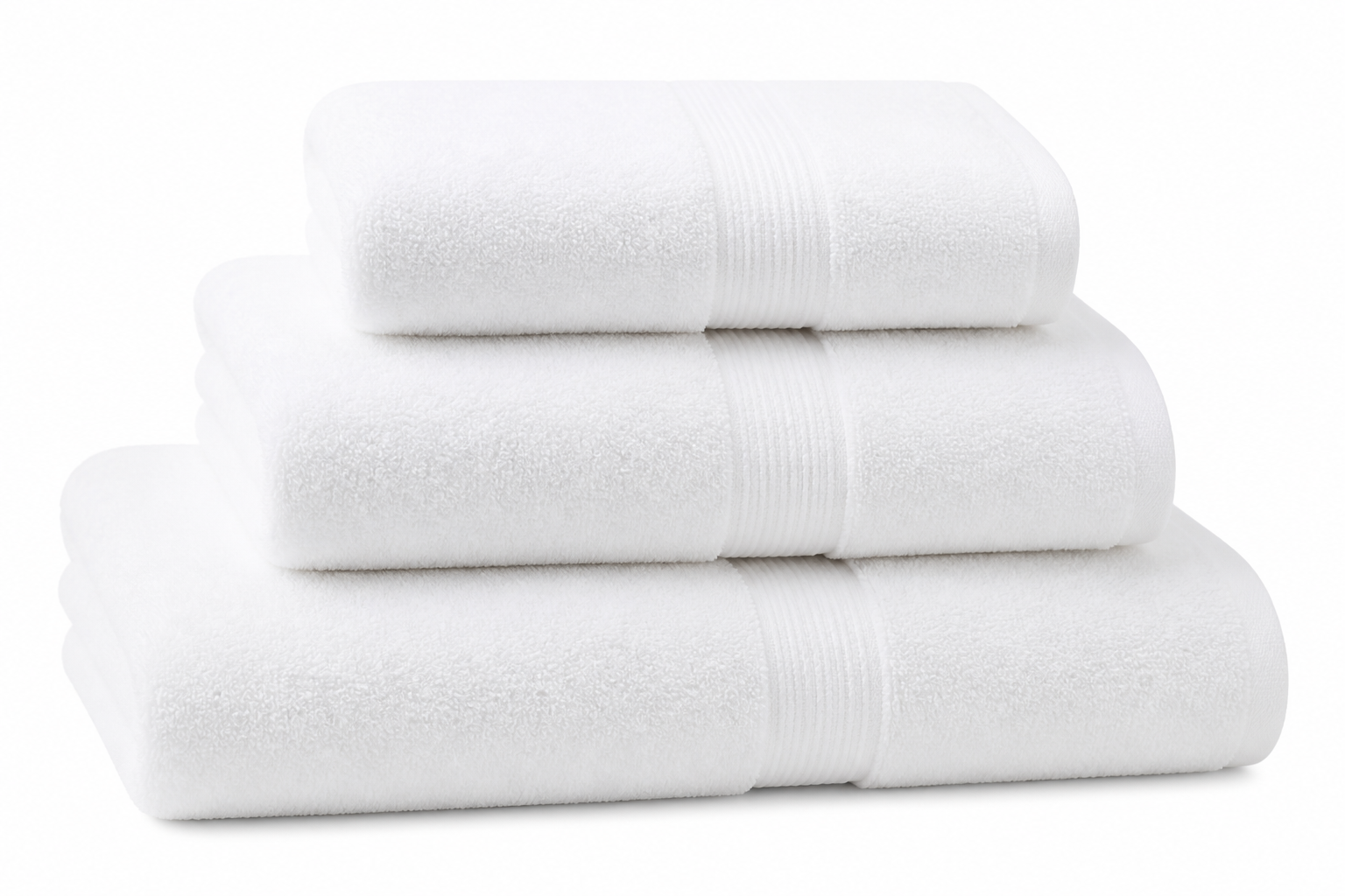 Folded white hotel towel sets in small, medium, and large sizes